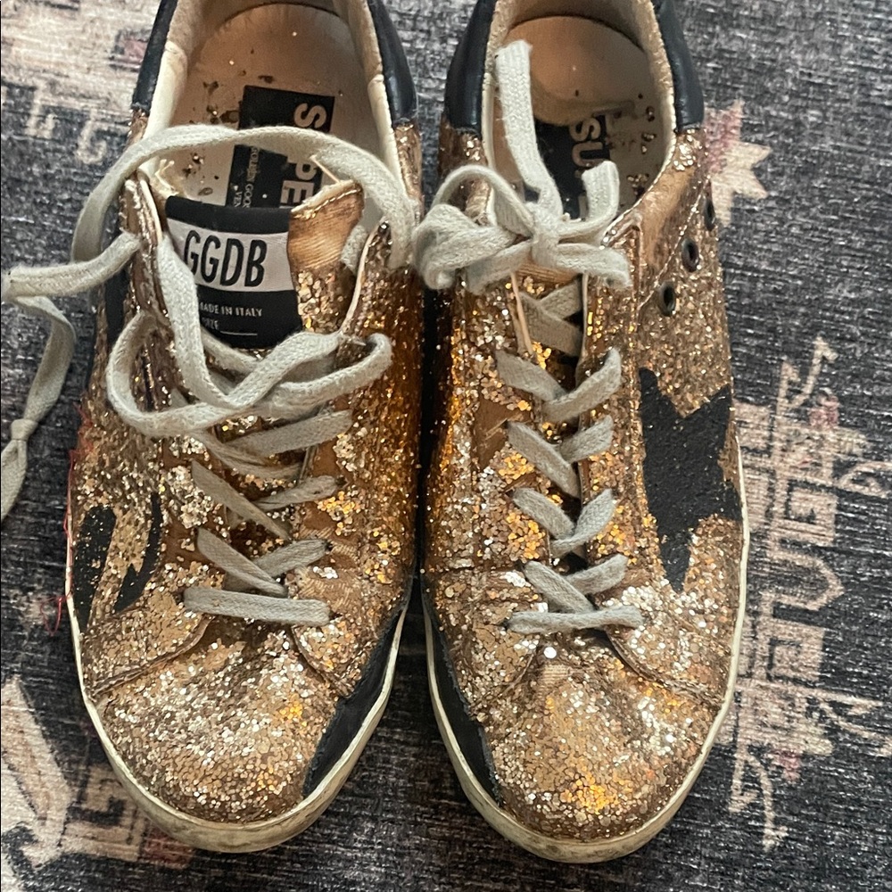 Golden Goose Glitter Star Sneakers in Gold and Black